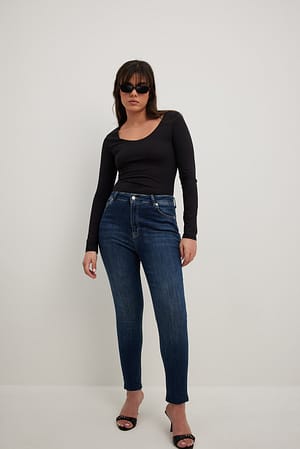 Dark Blue Jean slim taille haute à ourlet brut