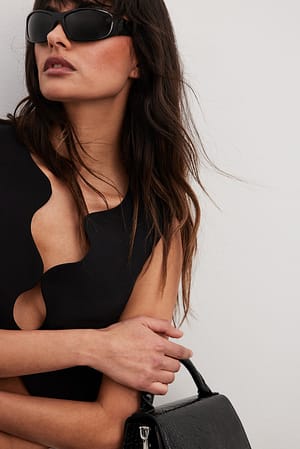 Black Lunettes de soleil fines enveloppantes