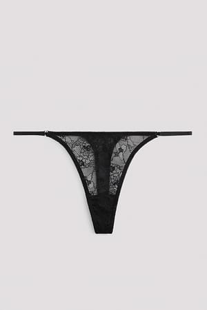 Black String avec petit détail cœur