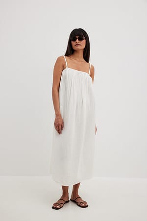 Offwhite Robe mi-longue en coton doux nouée dans le dos