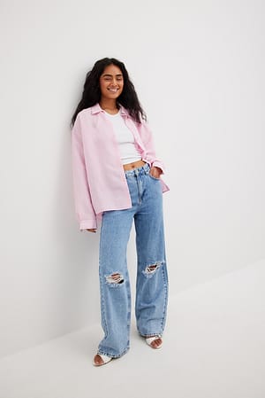 Light Blue Jeans large rigide doux déchiré