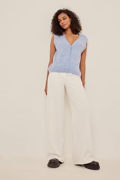 Fine Knitted Pearl Button Vest Outfit.