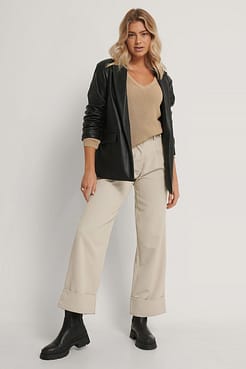 Deep Front V-neck Knitted Sweater Outfit.