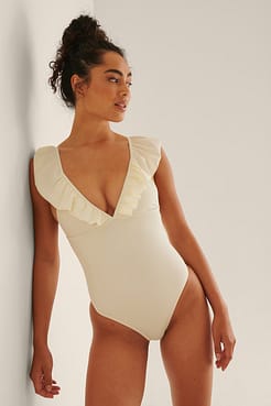 Deep Neck Frill Swimsuit Outfit.