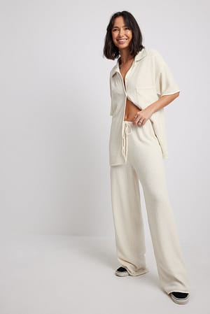 Off White Pantalon droit en maille