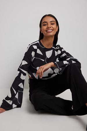 Slashed Black Blouse à manches trompette et lanières