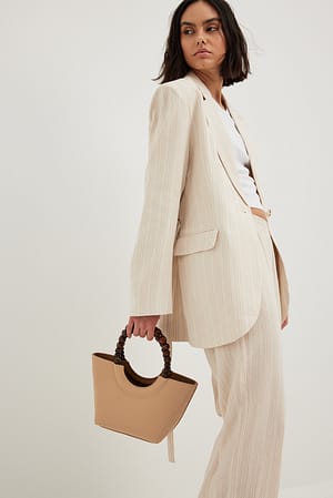 Beige Sac à main avec perles en bois