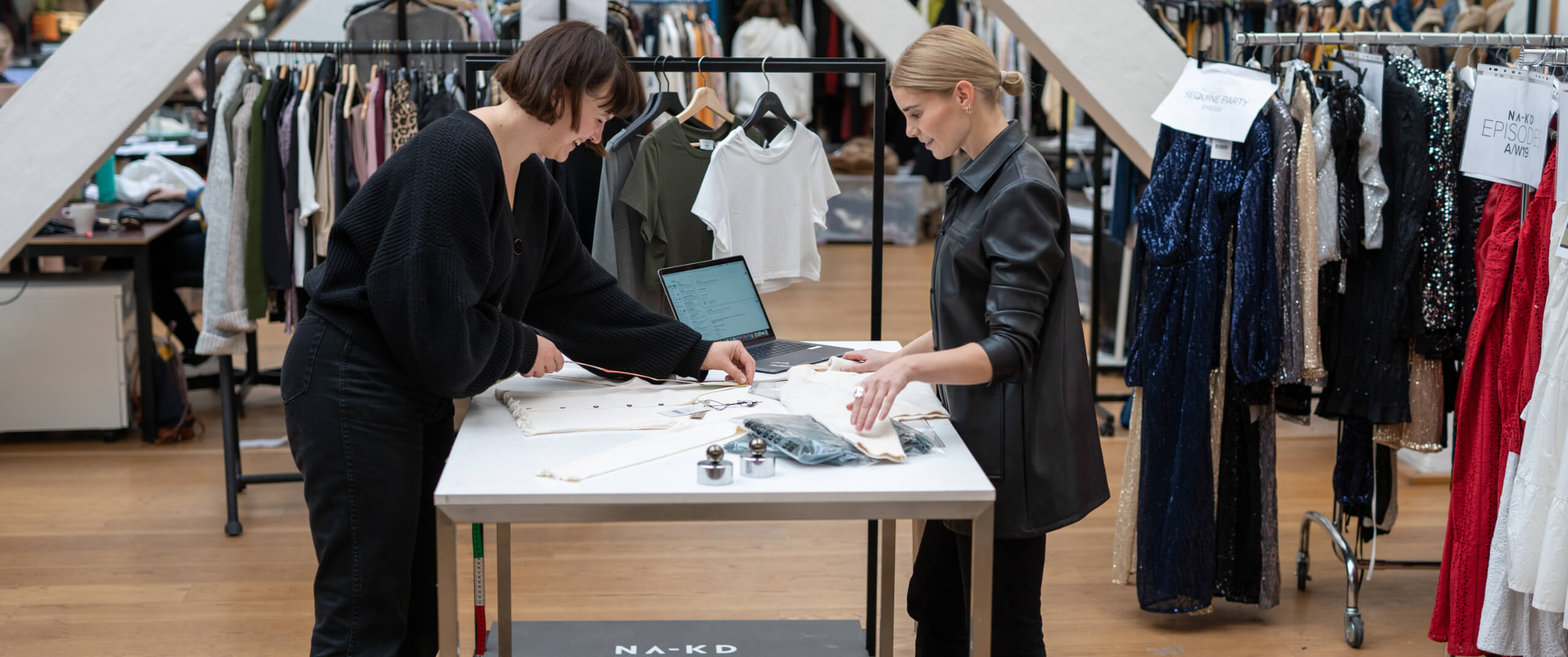 Two of our employees at NA‑KD